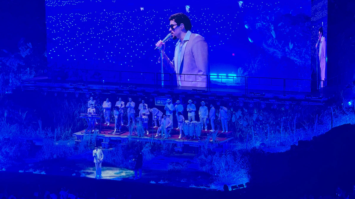 Bad Bunny performing on stage, illustrating his Emmy-winning performance style
