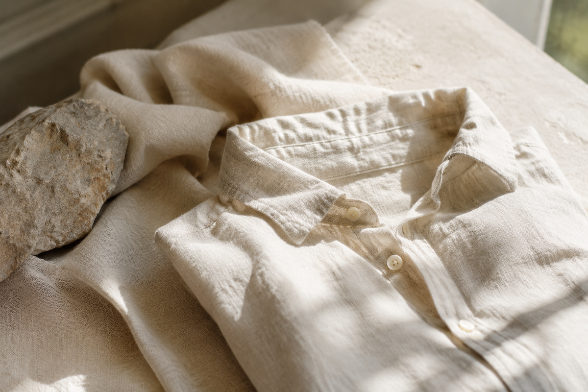 Natural ivory linen shirt and fabric in soft window light