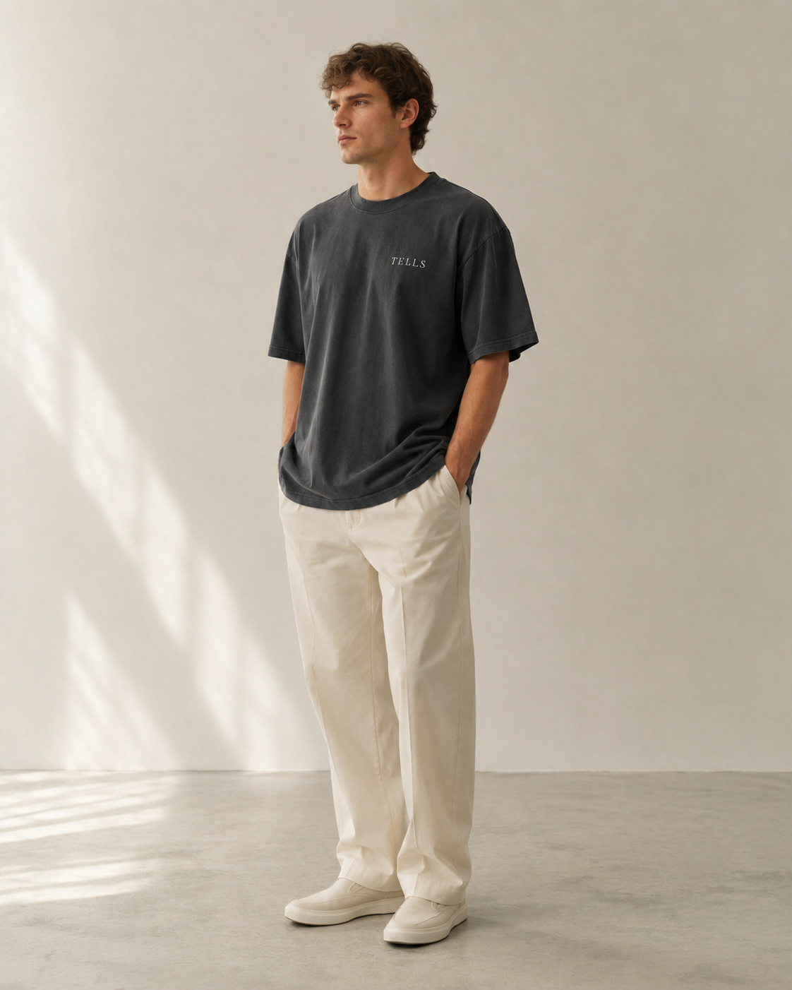 TELLS Faded Oversized Black T-Shirt