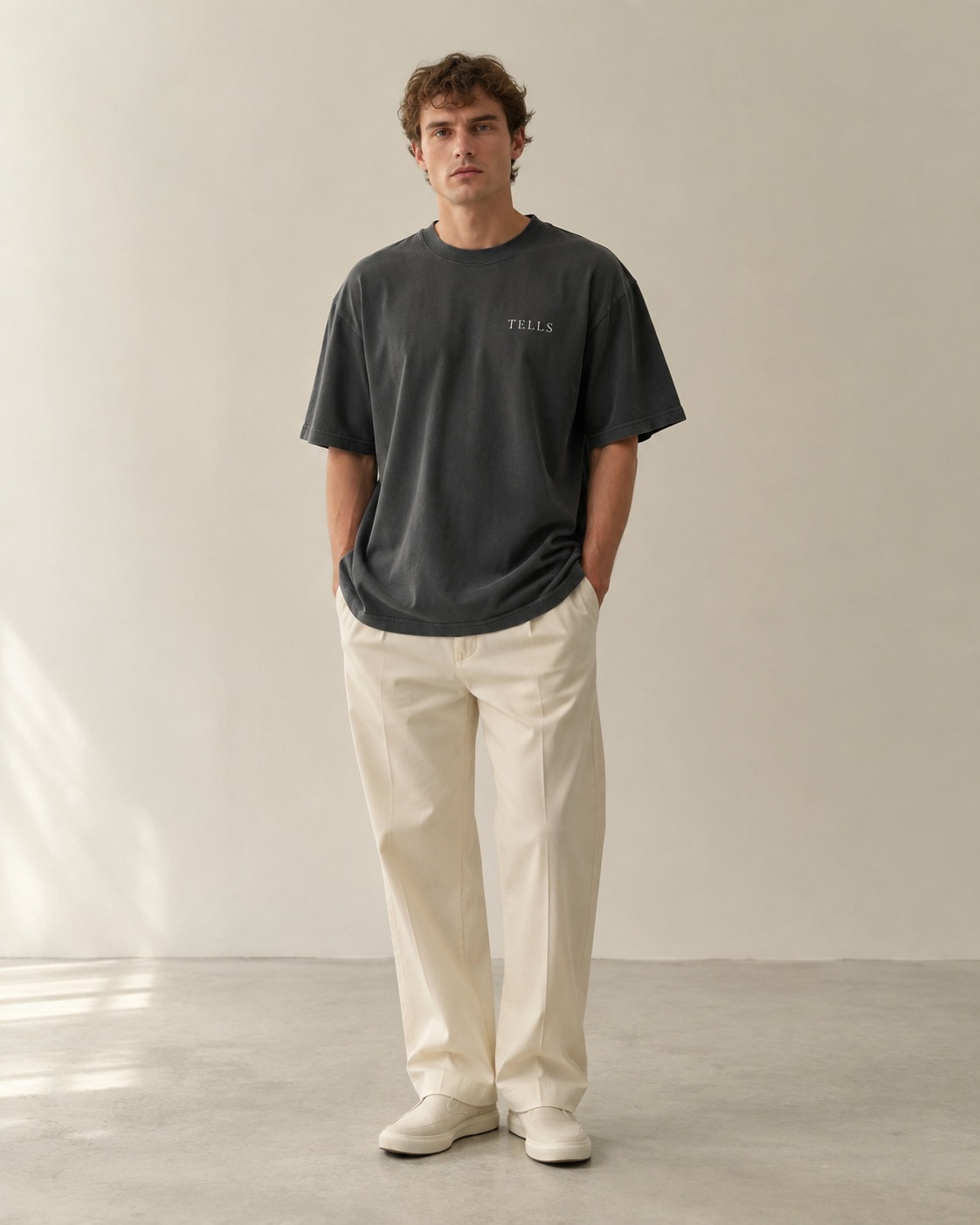 TELLS Faded Oversized Black T-Shirt