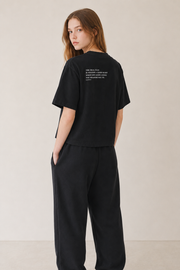 Women’s TELLS Real Flex Black Boxy Tee