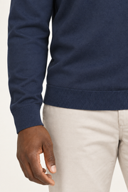 Cuff and hem close-up of Still Hours Crewneck Sweater in Navy, showing the fine Navy knit texture and ribbed edges.