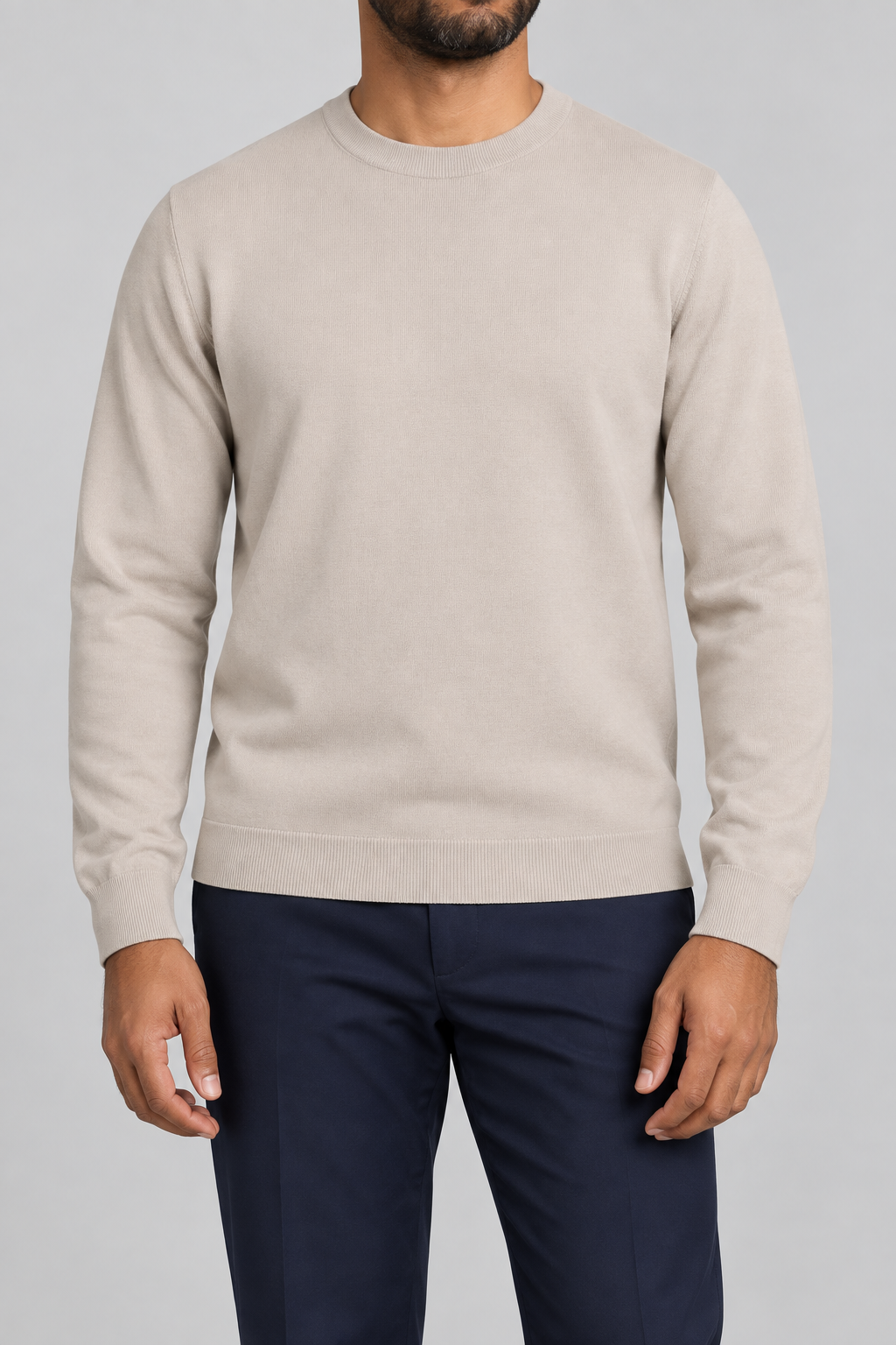 Front studio view of Still Hours Crewneck Sweater in Sand, showing the plain front and crew neckline.