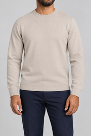 Front studio view of Still Hours Crewneck Sweater in Sand, showing the plain front and crew neckline.