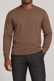 Front studio view of Still Hours Crewneck Sweater in Toffee, showing the plain front and crew neckline.