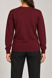 Rear studio view of Quiet Form Crewneck Sweater in Burgundy, showing the plain back and ribbed hem.