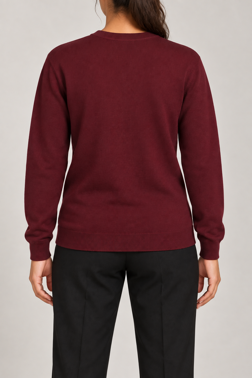 Rear studio view of Quiet Form Crewneck Sweater in Burgundy, showing the plain back and ribbed hem.