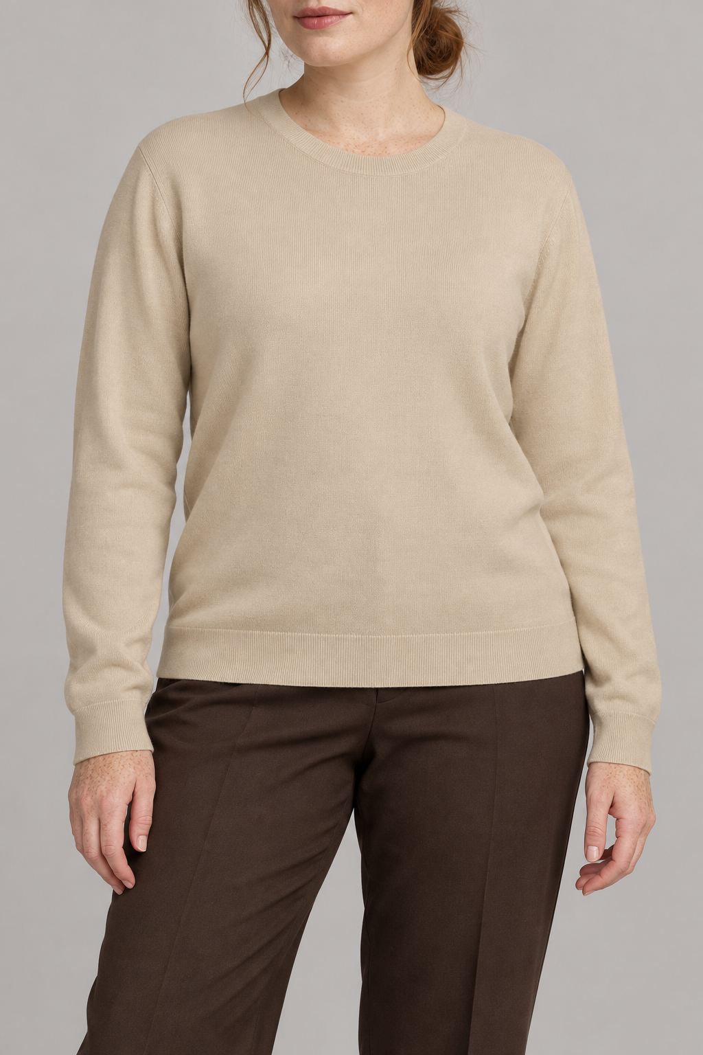 Front studio view of Quiet Form Crewneck Sweater in Beige, showing the plain knit and classic fit.