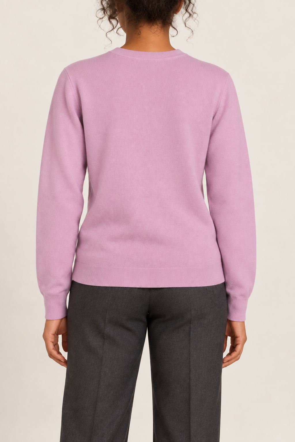 Rear studio view of Quiet Form Crewneck Sweater in Lilac, showing the plain back and ribbed hem.