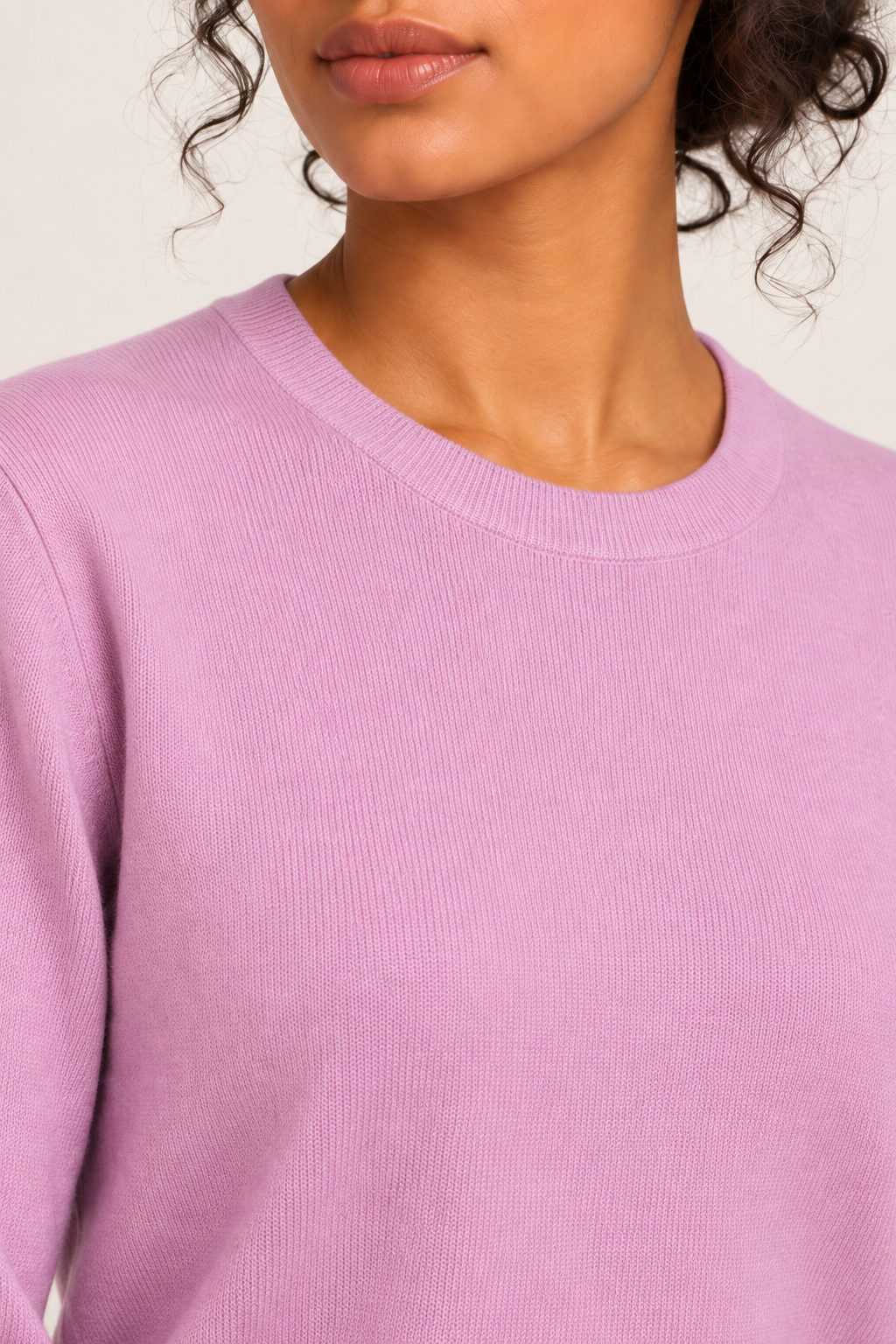 Close-up neckline detail of Quiet Form Crewneck Sweater in Lilac, showing the fine knit and ribbed crew collar.