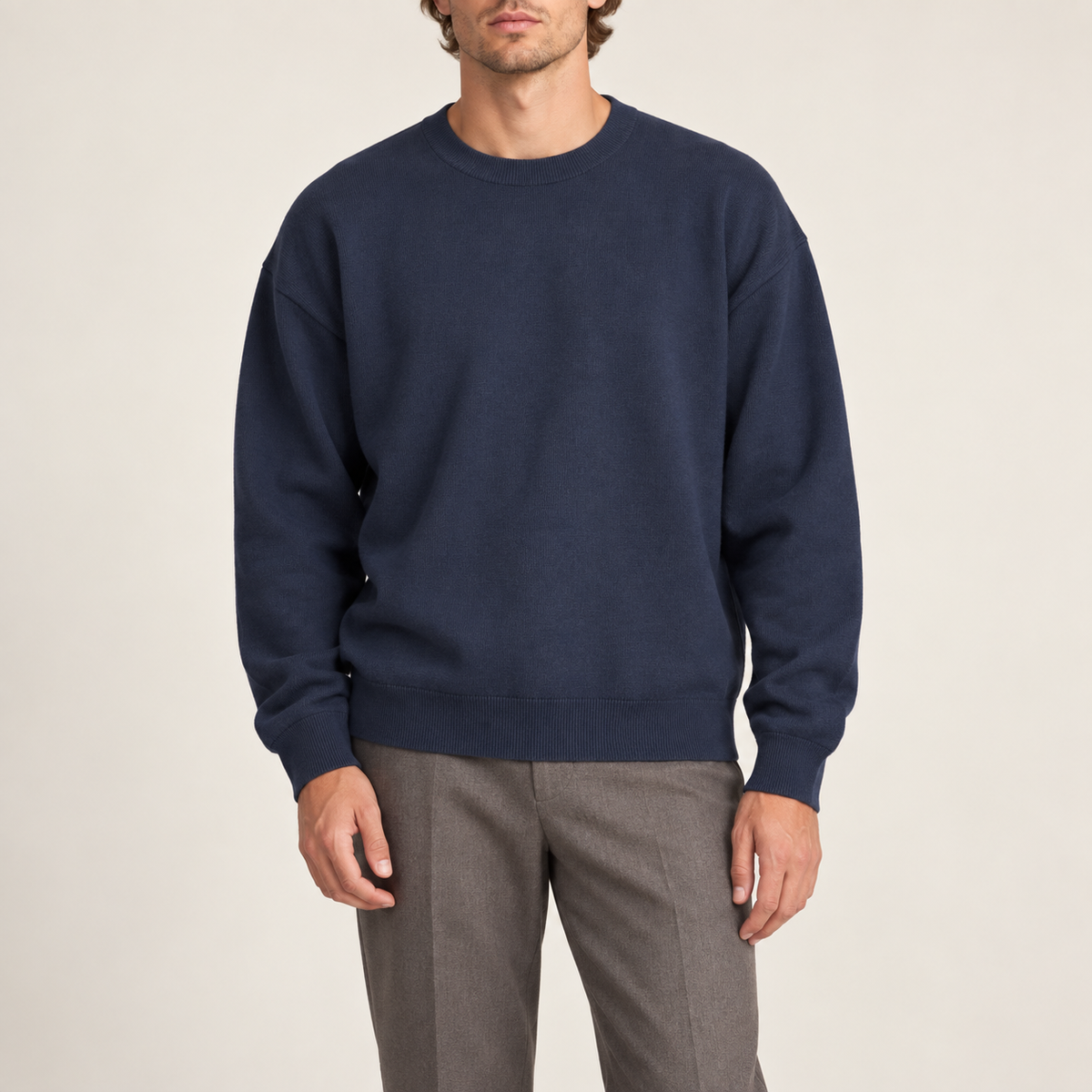 Front studio view of Slow Days Relaxed Crewneck in Navy, showing the plain knit and relaxed fit.