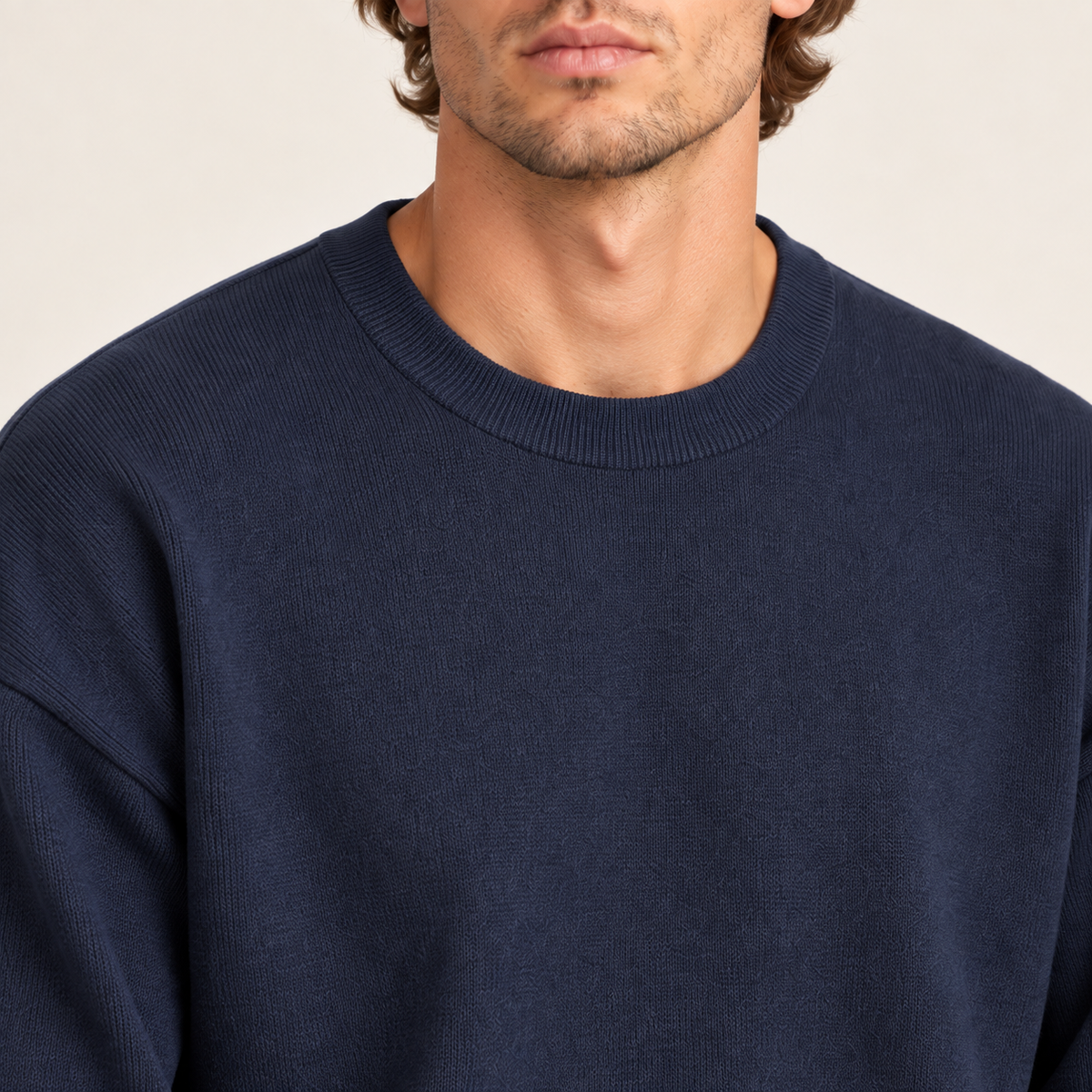 Close-up neckline detail of Slow Days Relaxed Crewneck in Navy, showing the fine knit and ribbed crew collar.