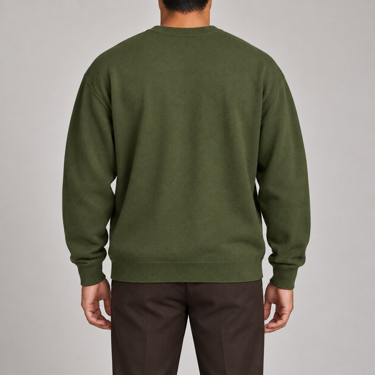 Slow Days Relaxed Crewneck in Olive. Rear studio view showing the plain olive back and ribbed hem.