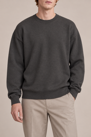 Slow Days Relaxed Crewneck in Charcoal. Front view of the plain charcoal knit and relaxed crew neckline.