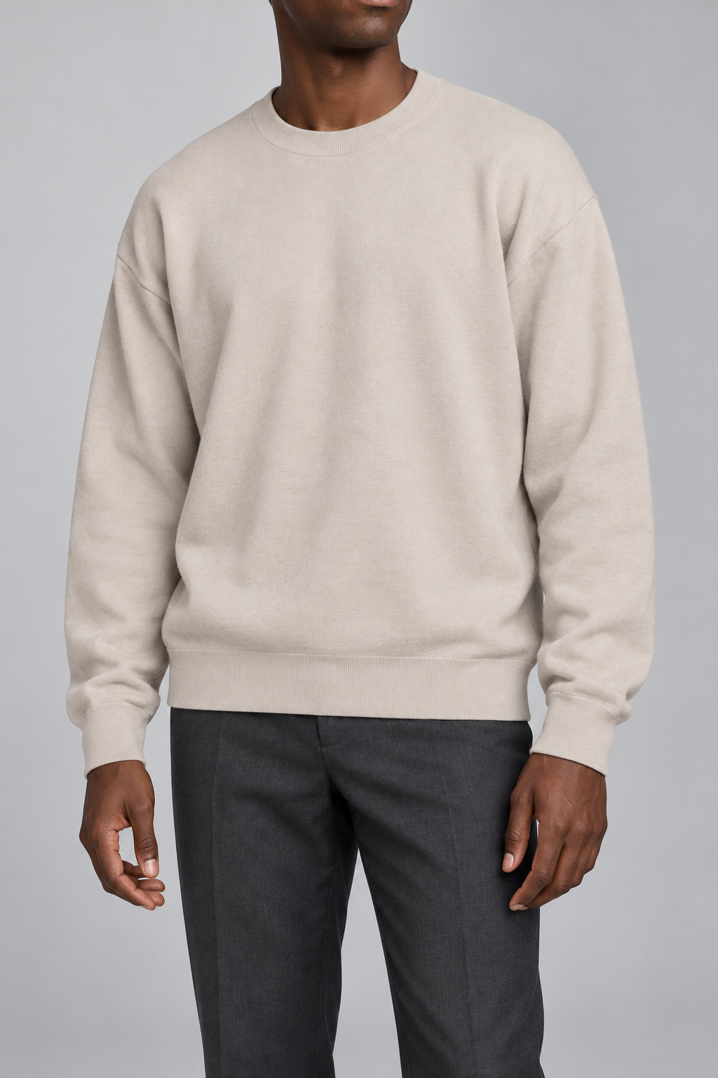 Slow Days Relaxed Crewneck in Sand. Front view of the plain Sand knit and relaxed crew neckline.