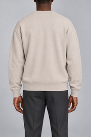 Slow Days Relaxed Crewneck in Sand. Rear view of the plain Sand back and ribbed hem.