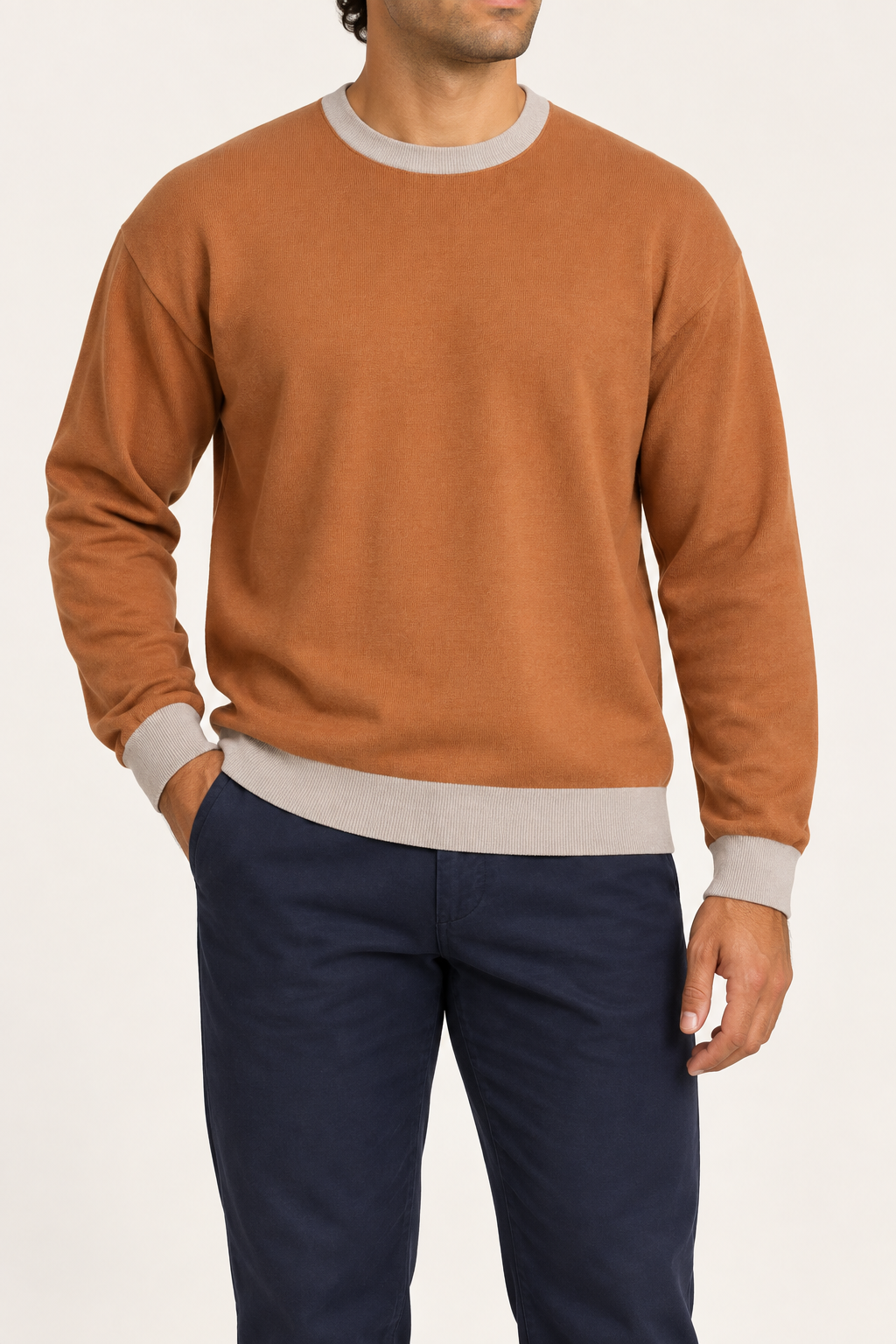 Slow Days Relaxed Crewneck in Rust with Coco Trim. Front view showing the Rust knit body and Coco contrast neckline, cuffs and hem.