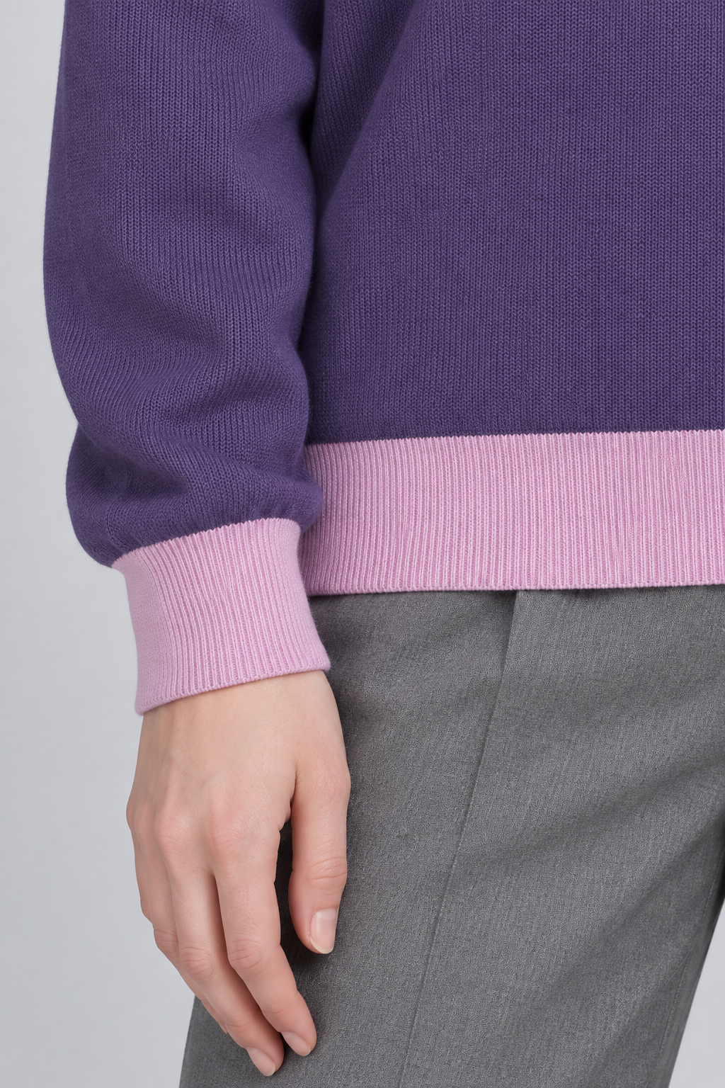 Soft Pause Relaxed Crewneck in Violet with Lilac Trim. Close-up showing the fine Violet knit and Lilac ribbed cuff and hem.