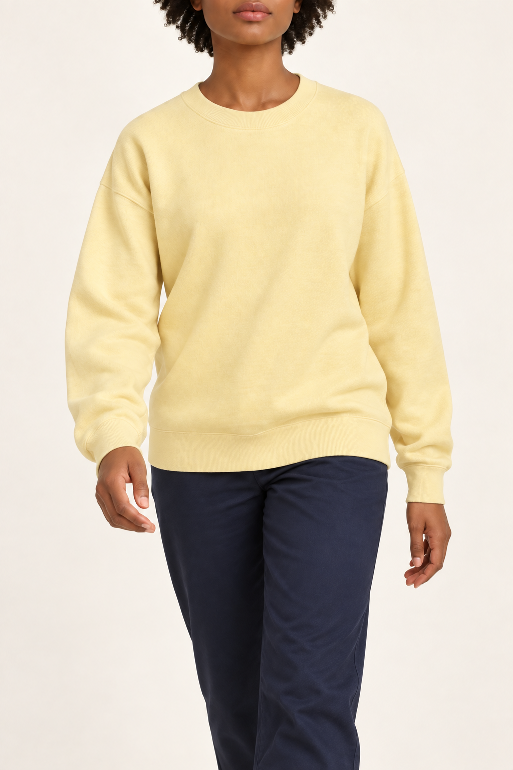 Soft Pause Relaxed Crewneck in Mellow. Movement view showing the relaxed Mellow knit drape.
