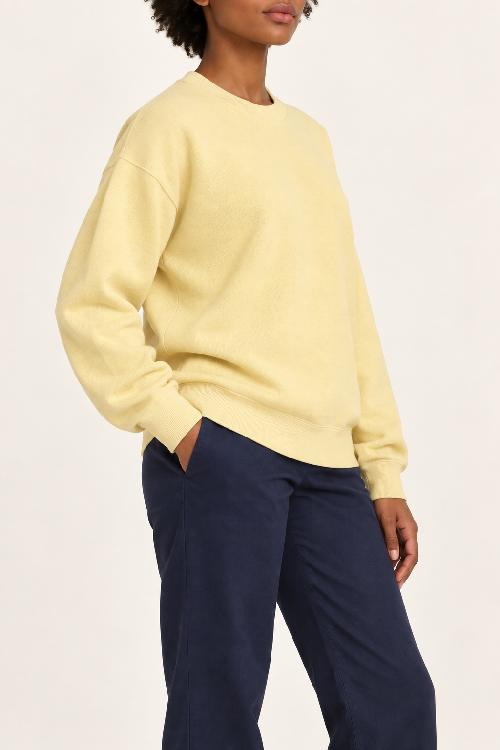 Soft Pause Relaxed Crewneck in Mellow. Three-quarter view showing the relaxed Mellow silhouette.