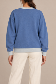 Soft Pause Relaxed Crewneck in Denim with Powder Trim. Rear view showing the plain Denim back and Powder trim.