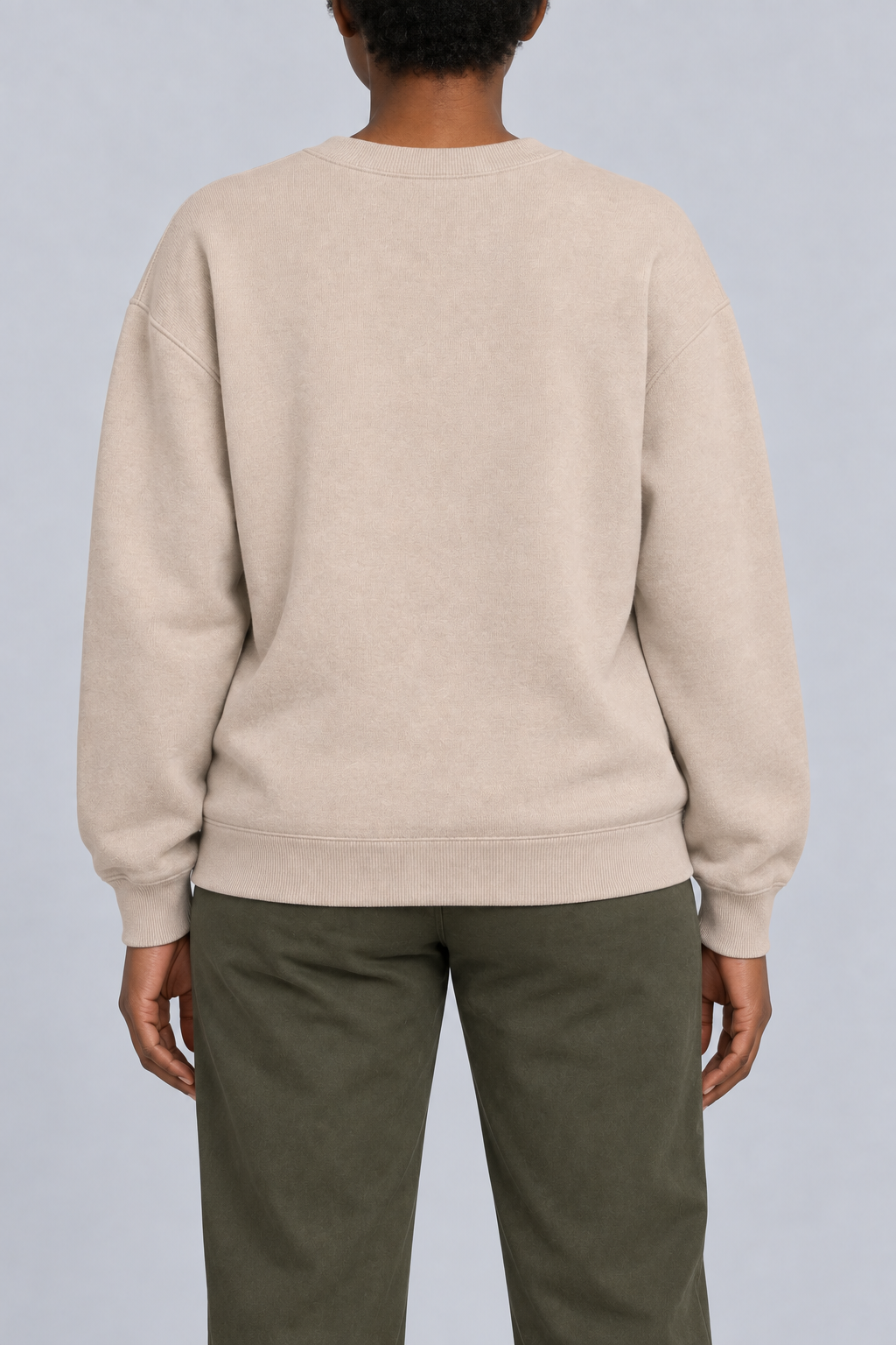 Soft Pause Relaxed Crewneck in Taupe. Rear view showing the plain Taupe back and matching ribbed hem.