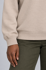 Soft Pause Relaxed Crewneck in Taupe. Close-up showing the fine Taupe knit and ribbed cuff and hem.