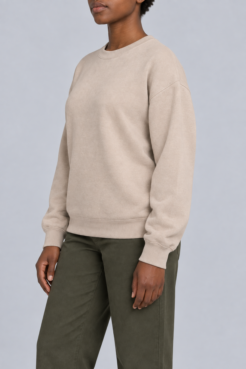 Soft Pause Relaxed Crewneck in Taupe. Side view showing the relaxed Taupe silhouette.