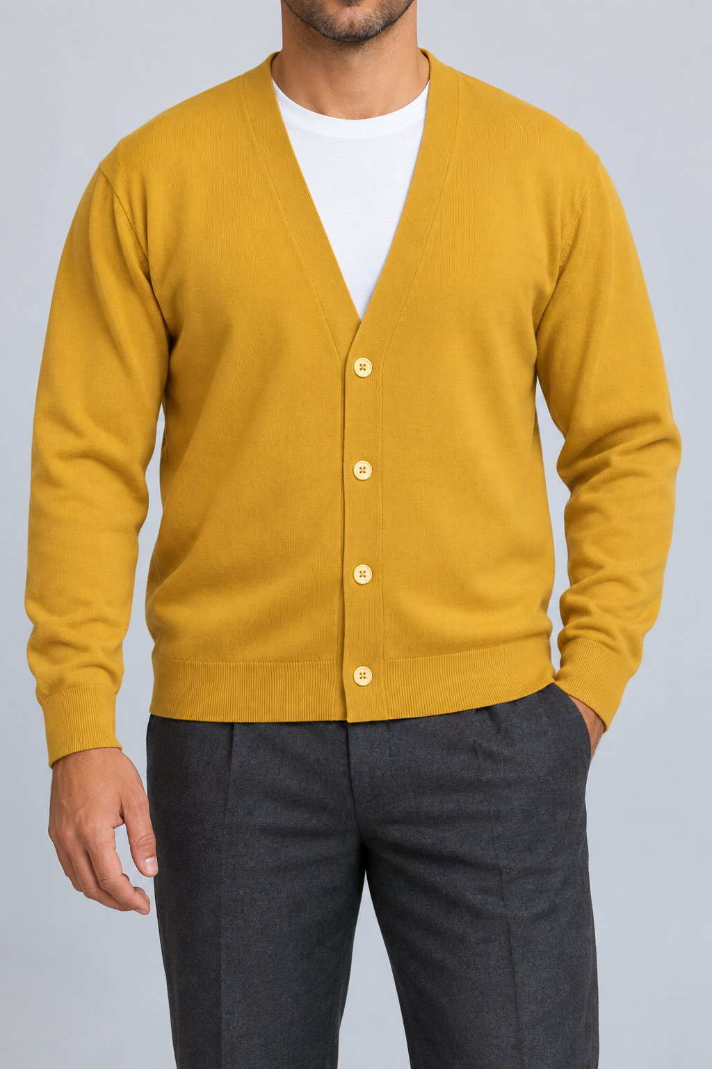 After Hours Cardigan in Mustard. Front studio view showing the plain knit and four-button V-neck front.