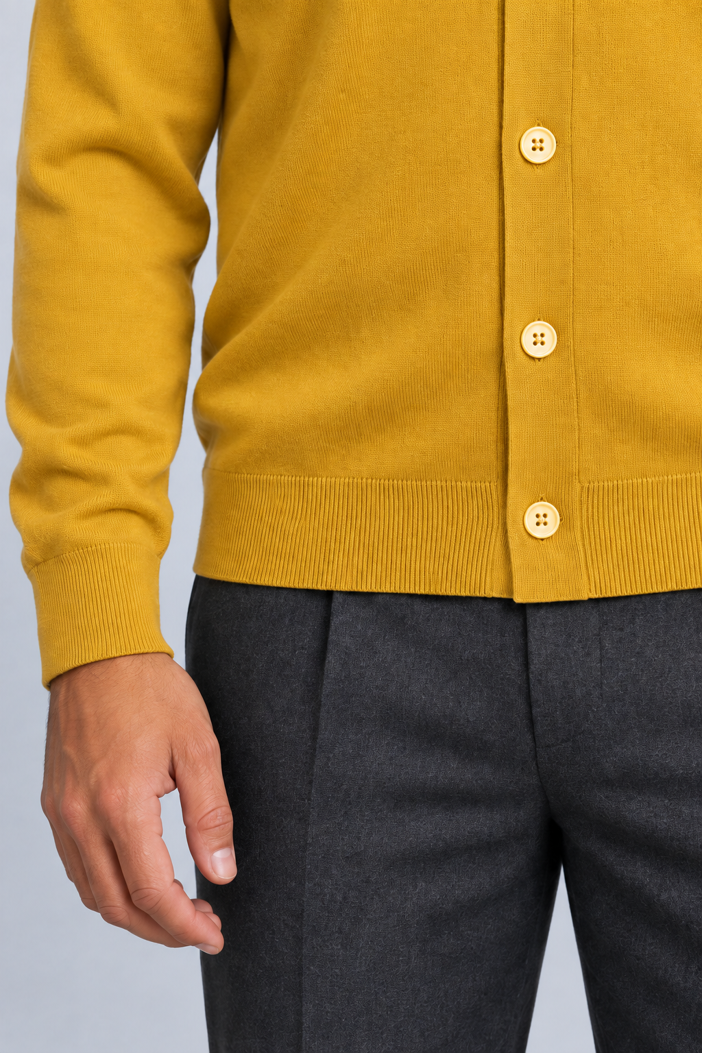 After Hours Cardigan in Mustard. Close-up showing the buttons, ribbed hem and cuff.