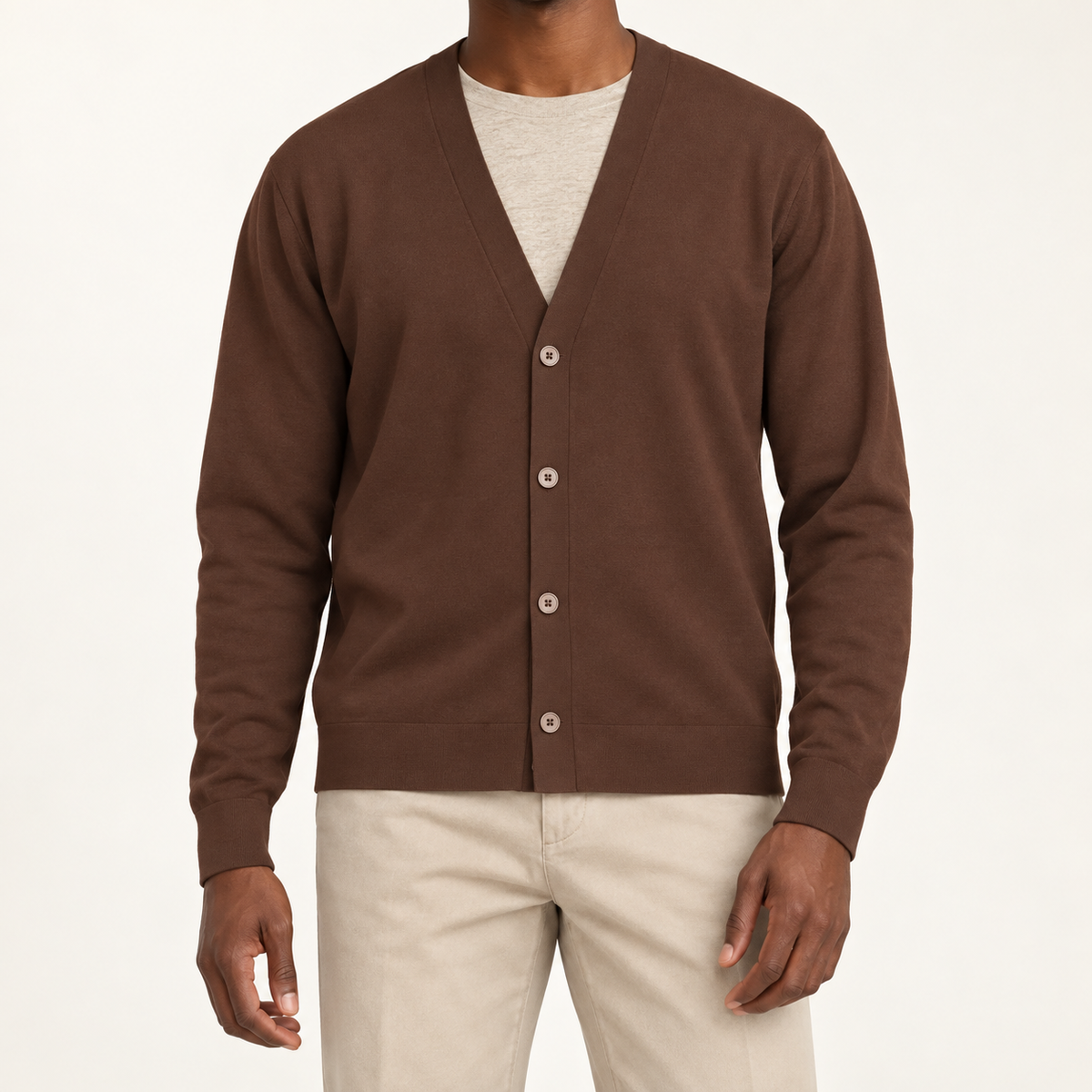 After Hours Cardigan in Soil. Front studio view showing the plain knit and four-button V-neck front.