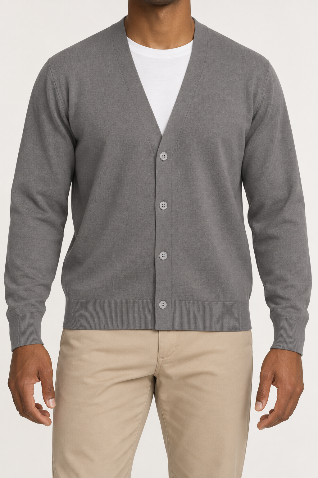 After Hours Cardigan in Dk Grey. Front studio view showing the plain knit and four-button V-neck front.