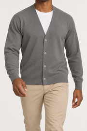 After Hours Cardigan in Dk Grey. Walking studio view showing the long sleeves and natural knit drape.