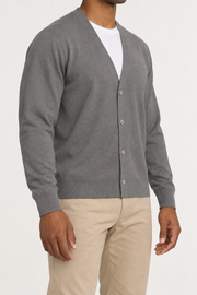After Hours Cardigan in Dk Grey. Three-quarter studio view showing the side silhouette and button front.