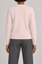Soft Interval Cardigan in Lt Pink. Rear studio view showing the plain pink back and matching ribbed edges.