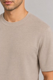 Close-up detail of Open Hours Knit T-Shirt in Coco, showing Coco knit texture and matching neck band.