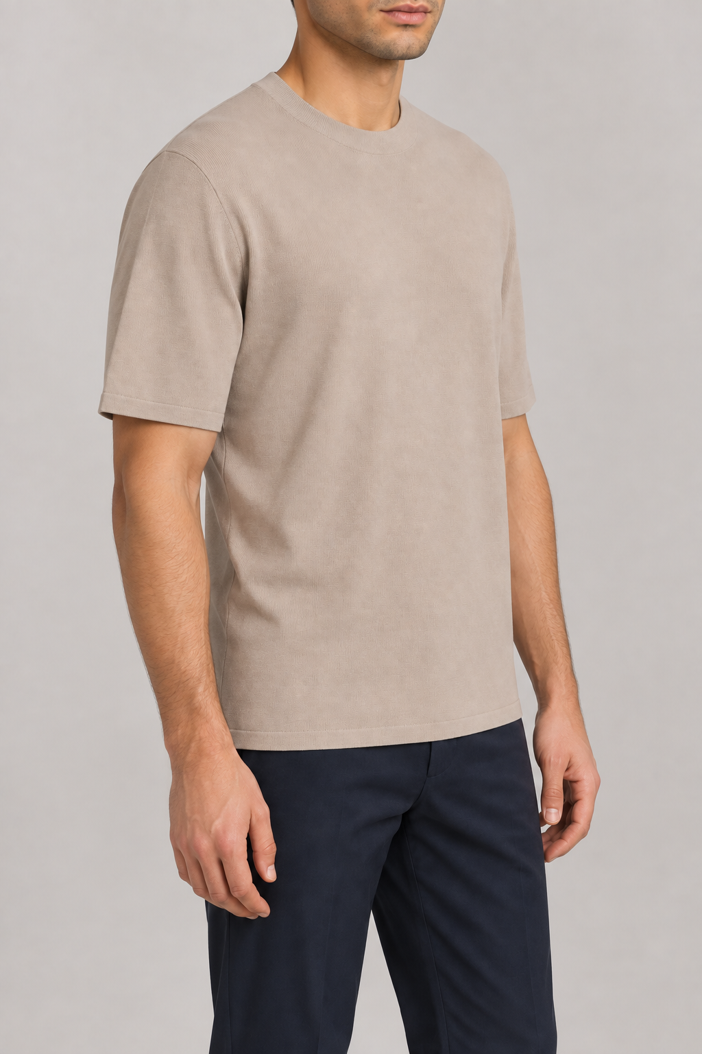 Three-quarter studio view of Open Hours Knit T-Shirt in Coco, showing short sleeves and clean neutral silhouette.