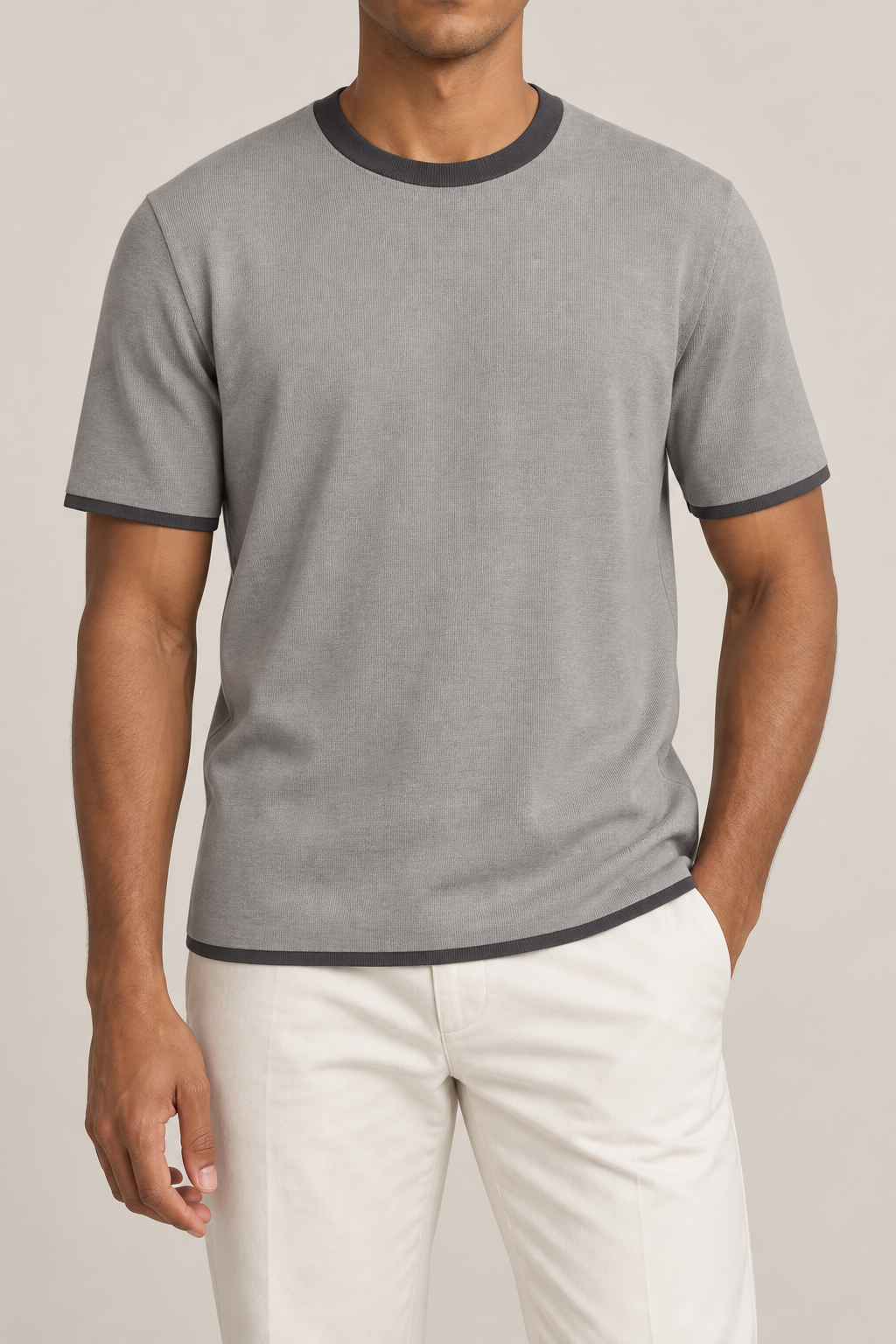 Front studio view of Open Hours Knit T-Shirt in Grey with Charcoal Trim, showing plain grey knit and charcoal crew neckline.