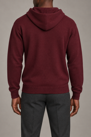 Rear view showing the plain back and draped hood of Off Hours Knit Hoodie in Burgundy.