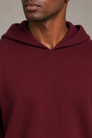 Detail view of the hood neckline and Burgundy knit texture of Off Hours Knit Hoodie in Burgundy.