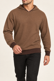 Walking view showing the relaxed knit drape and Soil edges of Off Hours Knit Hoodie in Toffee with Soil Trim.