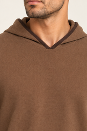 Detail view of the hood neckline and contrasting Soil edging of Off Hours Knit Hoodie in Toffee with Soil Trim.