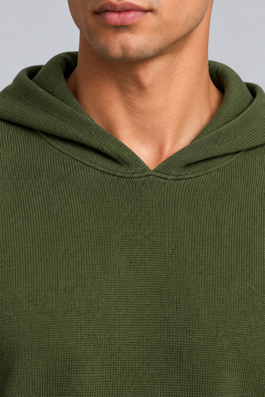 Detail view of the hood neckline and Olive knit texture of Off Hours Knit Hoodie in Olive.