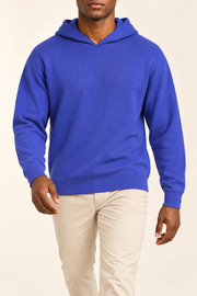 Walking view showing the soft knit drape and long sleeves of Off Hours Knit Hoodie in Royal.