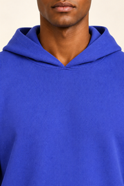 Detail view of the hood neckline and Royal knit texture of Off Hours Knit Hoodie in Royal.