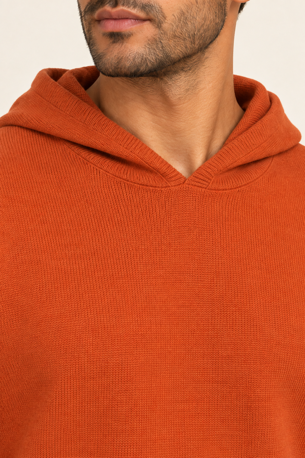 Detail view of the hood neckline and Burnt Orange knit texture of Off Hours Knit Hoodie in Burnt Orange.
