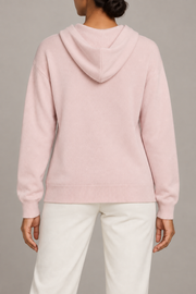 Rear view showing the plain pink back and draped hood of Quiet Ease Knit Hoodie in Lt Pink.