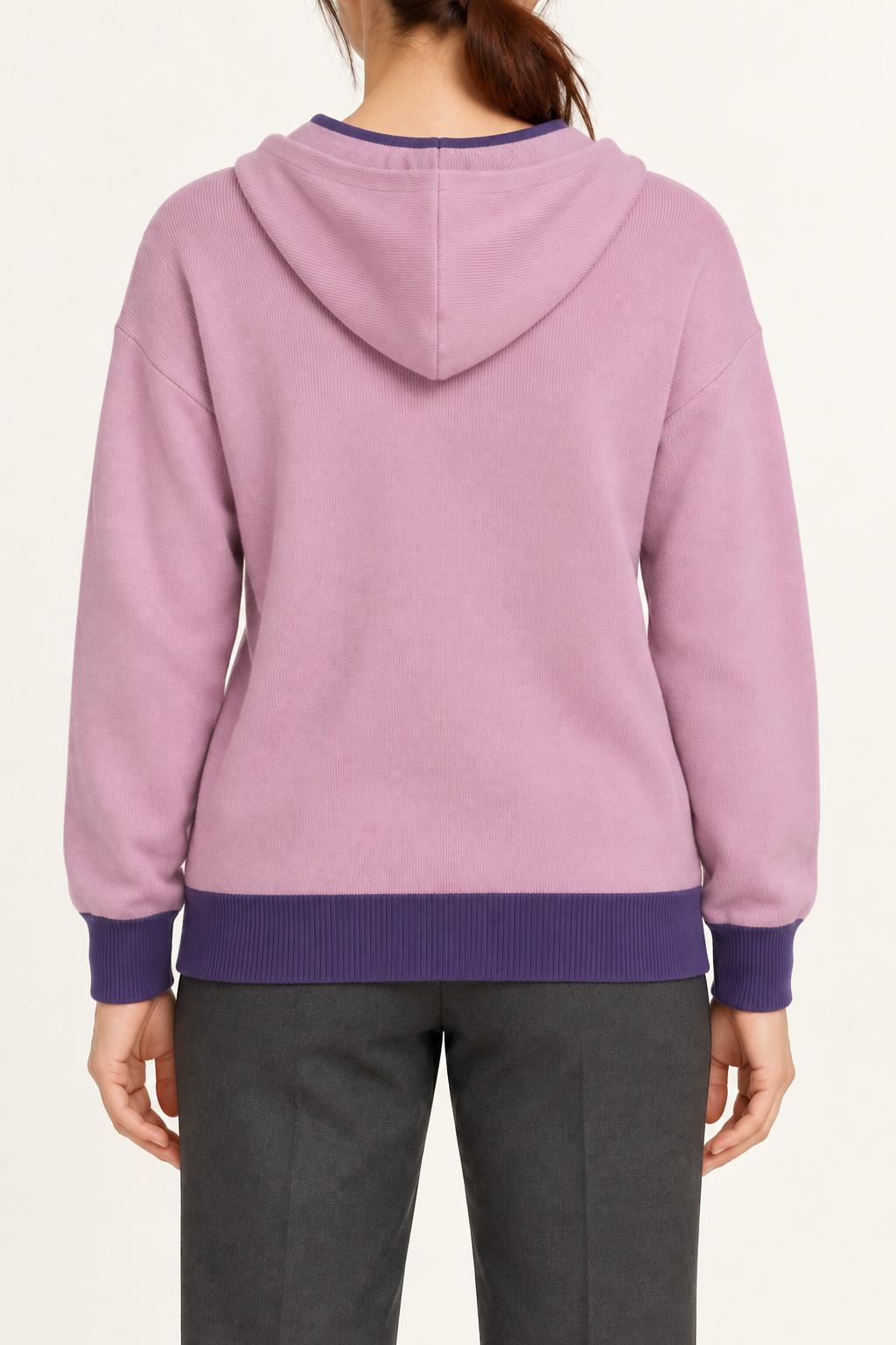 Rear view showing the plain back and contrasting Violet hem of Quiet Ease Knit Hoodie in Lilac with Violet Trim.