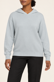 Hero front showing the plain Powder blue knit and hood of Quiet Ease Knit Hoodie in Powder.