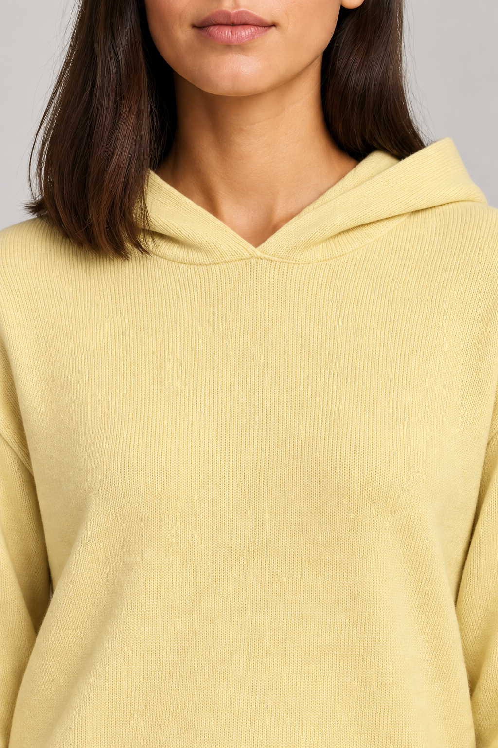 Detail view of the hood neckline and Mellow knit texture of Quiet Ease Knit Hoodie in Mellow.
